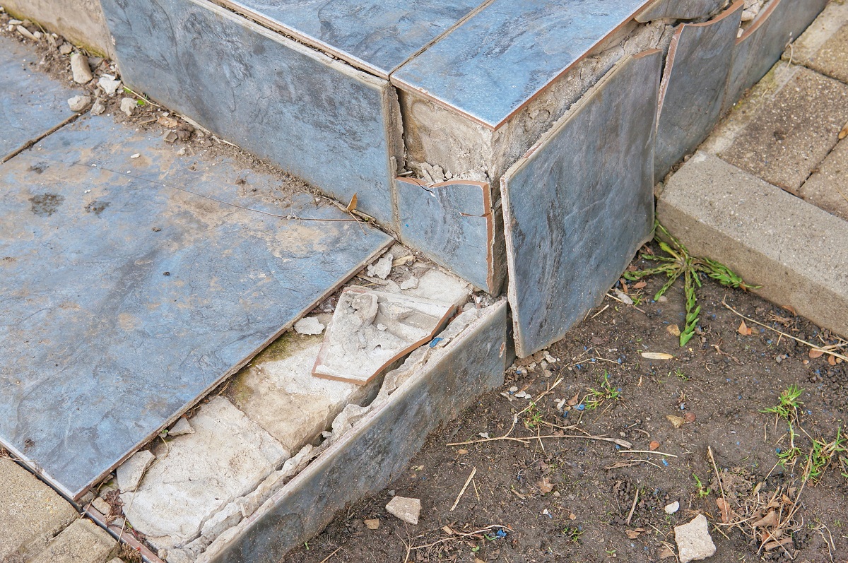 A front porch moving away from it's home due to foundation problems